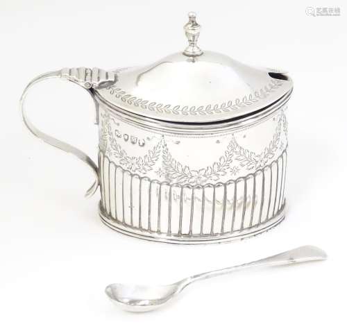 A Victorian silver mustard pot with fluted and bri…