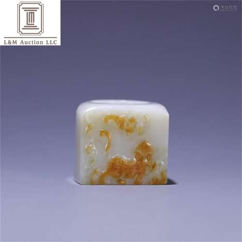 A Chinese Carved Jade Thumb Ring