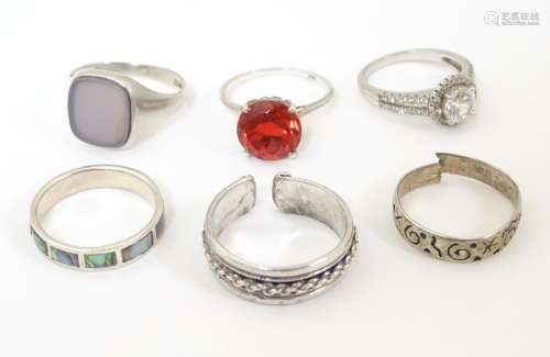 Six assorted silver rings, one with set with cubic…