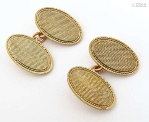 9ct gold cufflinks with engine turned decoration. …