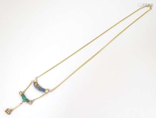 A 9ct gold necklace set with opal. Approx 19" lon…