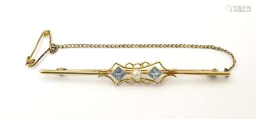 A 15ct gold bar brooch set with central pearl flan…