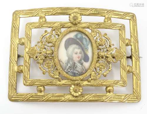 A late 19th / early 20thC gilt painted buckle form…