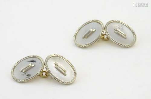 A pair of Art Deco cufflinks with mother of pearl …