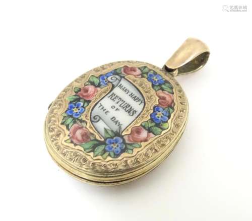 A gilt metal locket with enamel decoration. Approx…