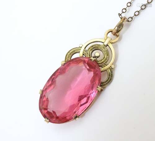 An Art deco pendant set with pink tourmaline colou…