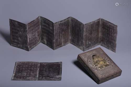 A Set of Gilt Silver Buddahist Scriptures