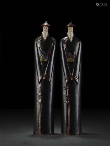 A Pair of Figure Ornaments