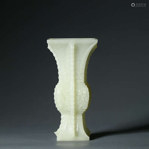 A Carved White Jade Beaker Vase