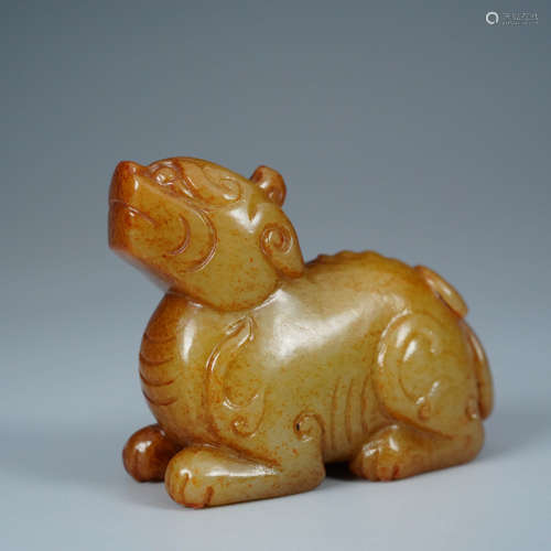 A Carved Russet Jade Mythical Beast