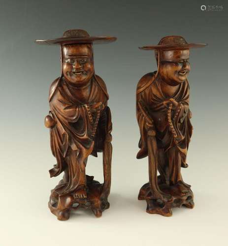 A pair of Chinese root carved figures, 2