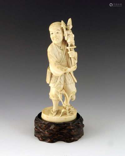 A 19th century Japanese carved ivory oki