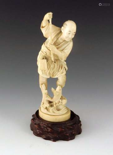 A 19th century Japanese carved ivory oki