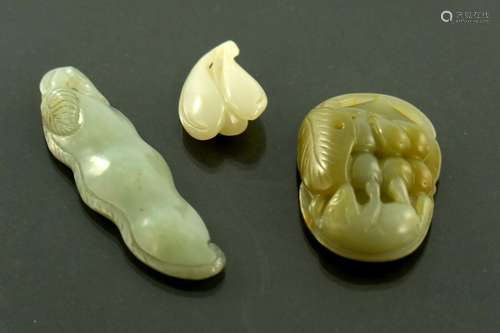 Three Chinese carved jade pendants, mode