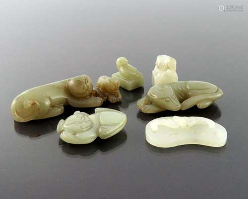 Six Chinese jade carvings, including sea