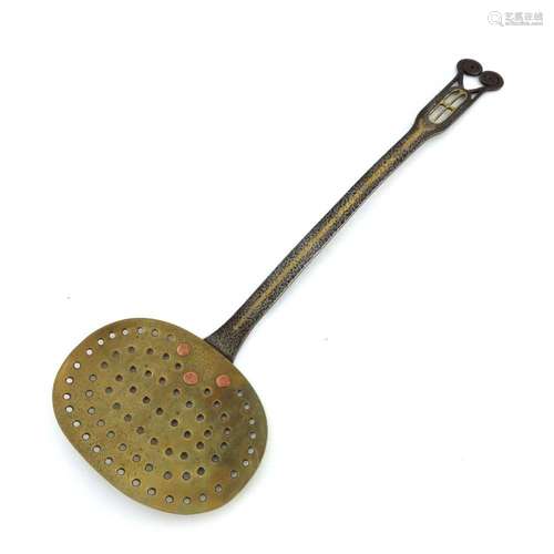 An Arts and Crafts bimetal skimmer or ch