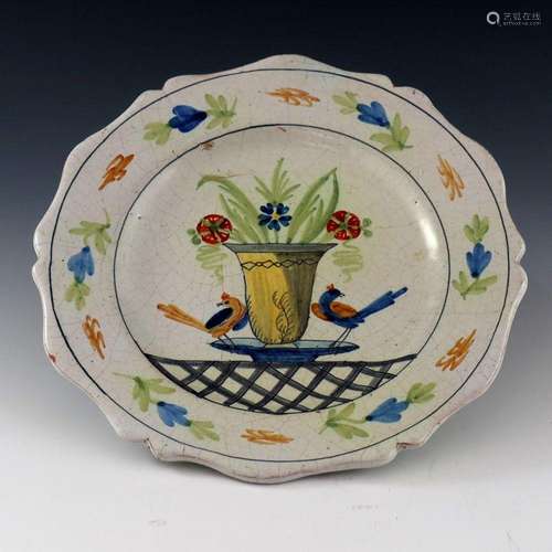 A French faience plate, circa 1800, pain