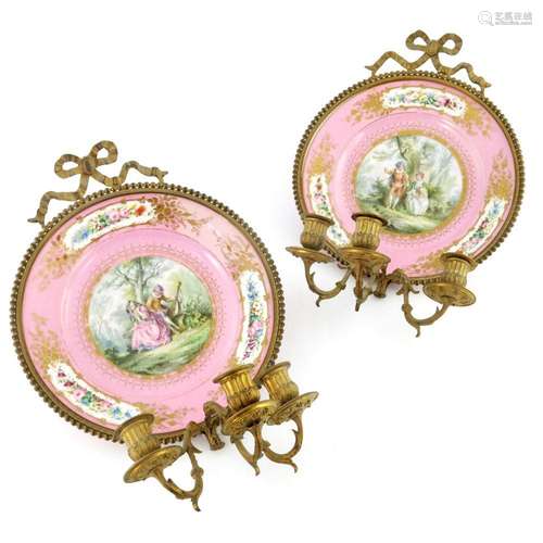 A pair of French Sevres style ormolu mou