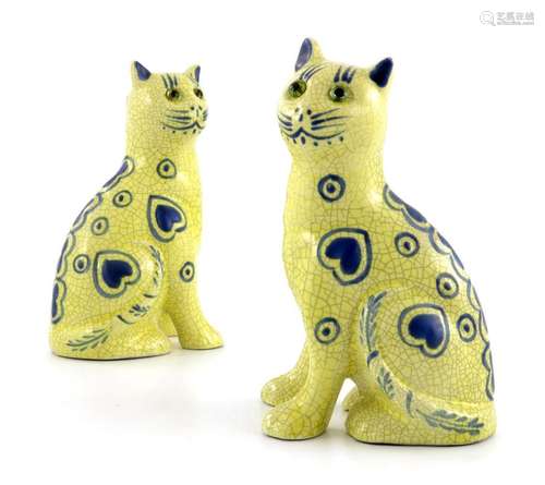 A pair of Galle style pottery cats, yell