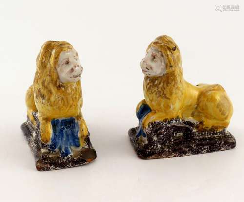 A pair of 18th century faience lions, mo