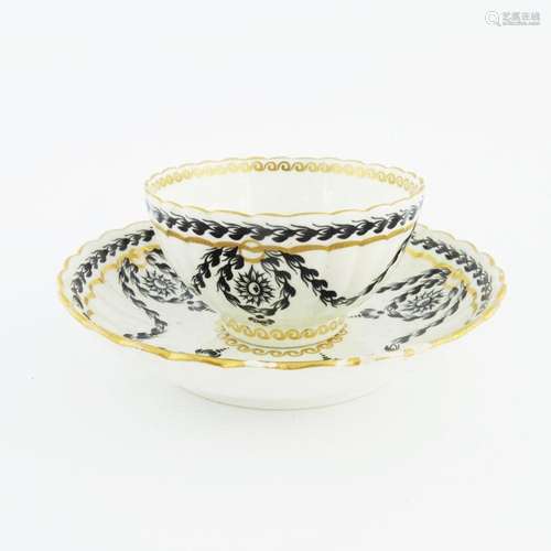 A Worcester reeded tea bowl and saucer,