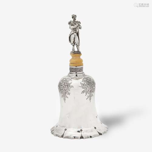 A DUTCH SILVER TABLE BELL MOUNTED WITH A FIGURE OF A CIVIL W...