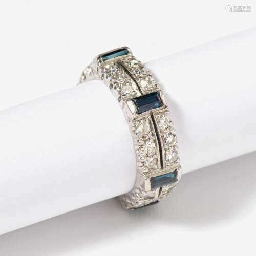 A SAPPHIRE AND DIAMOND ALLIANCE RING