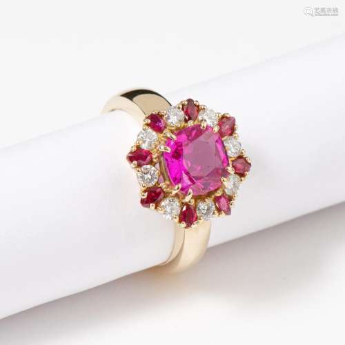 A 14 CARAT WHITE GOLD, DIAMOND AND RUBY CLUSTER RING