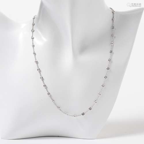 AN 18 CARAT WHITE GOLD AND DIAMOND RIVIÈRE STATION NECKLACE