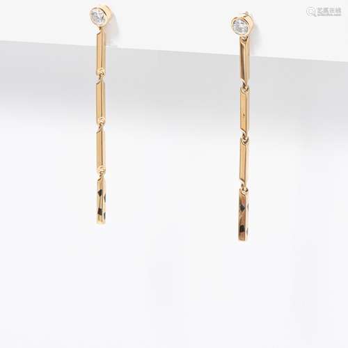 A PAIR OF 18 CARAT YELLOW GOLD AND DIAMOND EARRINGS BY CARTI...