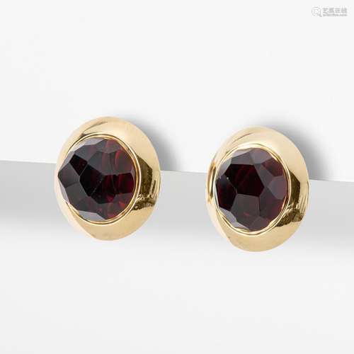 A PAIR OF 18 CARAT YELLOW GOLD AND GARNET EARRINGS BY POMELL...