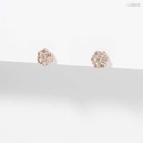 A PAIR OF 18 CARAT ROSE GOLD AND DIAMOND EARSTUDS