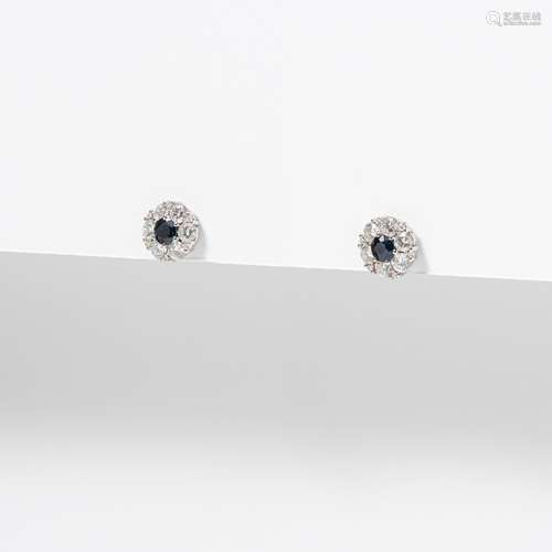 A PAIR OF WHITE GOLD SAPPHIRE AND DIAMOND CLUSTER EARRINGS