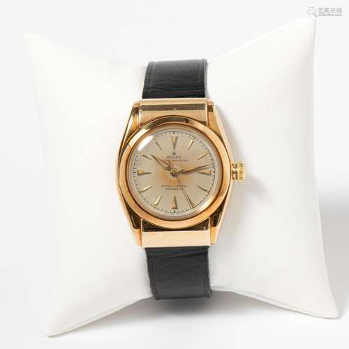 A YELLOW GOLD ROLEX OYSTER PERPETUAL WRISTWATCH