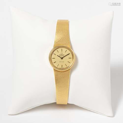 AN 18 CARAT GOLD OMEGA LADY’S WRISTWATCH