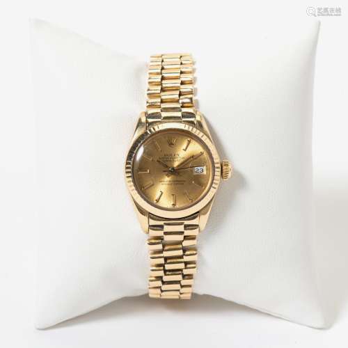 AN 18 CARAT GOLD ROLEX OYSTER PERPETUAL DATEJUST LADY’S WRIS...