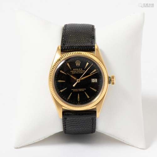 AN 18 CARAT YELLOW GOLD ROLEX OYSTER PERPETUAL DATEJUST WRIS...