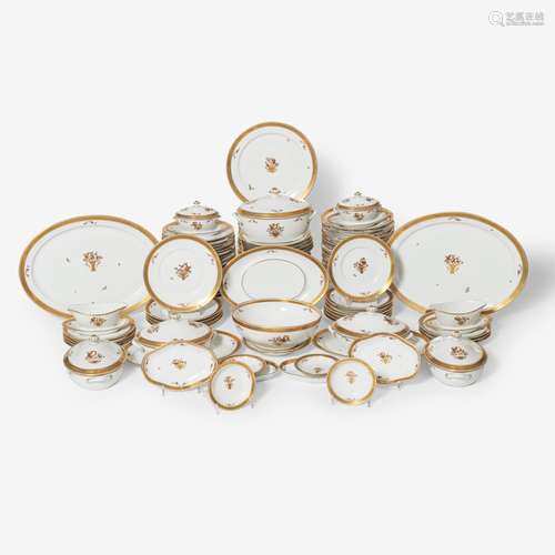 A ROYAL COPENHAGEN PORCELAIN 'GOLDEN BASKET' DINNE...