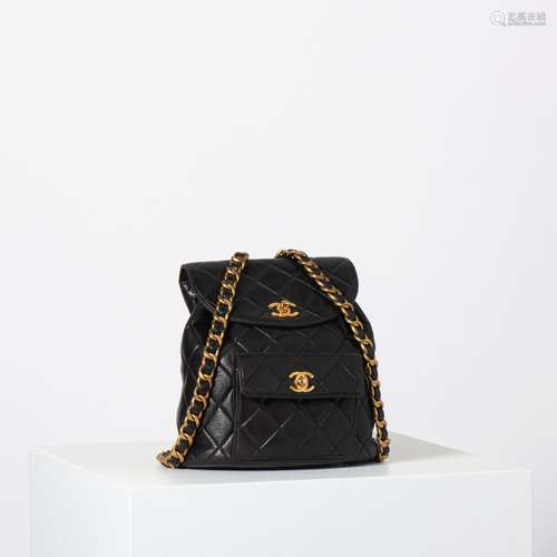 A CHANEL BLACK LAMBSKIN LEATHER MINI BACKPACK