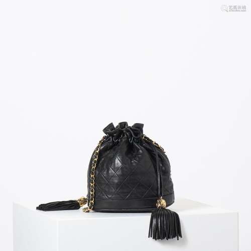 A CHANEL BLACK LAMBSKIN LEATHER BUCKET BAG