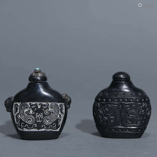 Two Carved Black Stone Snuff Bottles