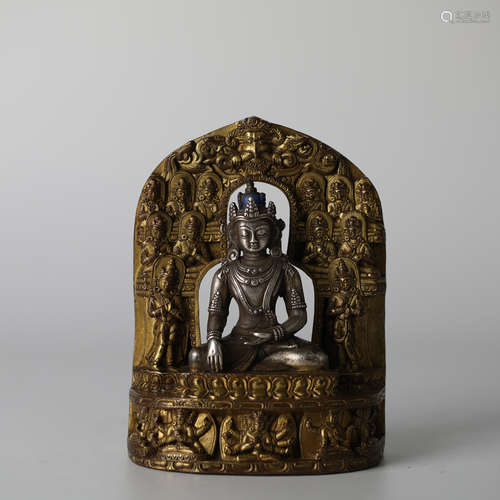 Ancient silver and metal Buddha statues