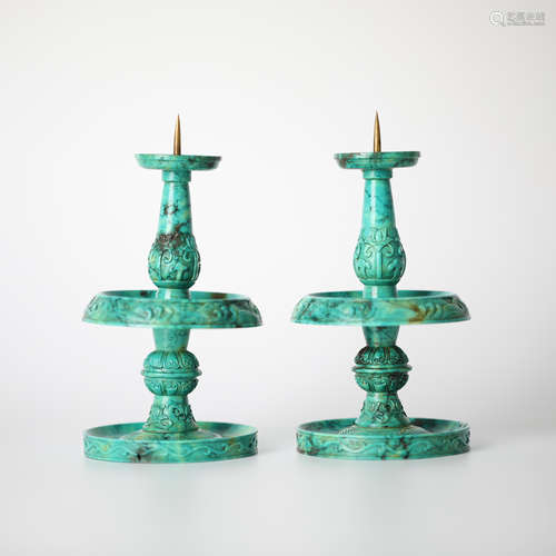 A pair of ancient Turquoise carved candle stands