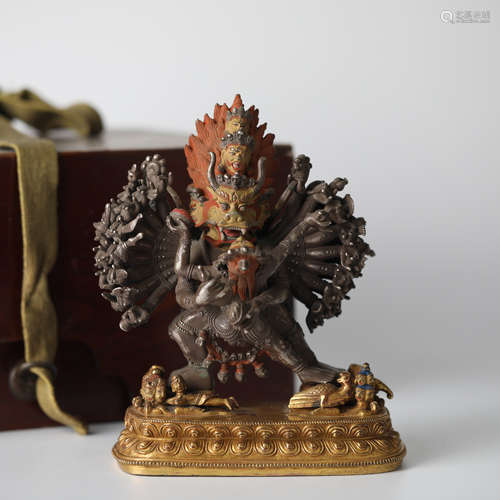 Silver and bronze Buddha statues