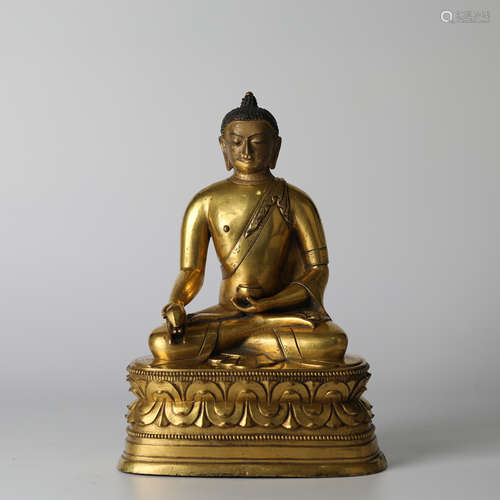 Bronze gilded Buddha statue (with heavenly beads embedded at...