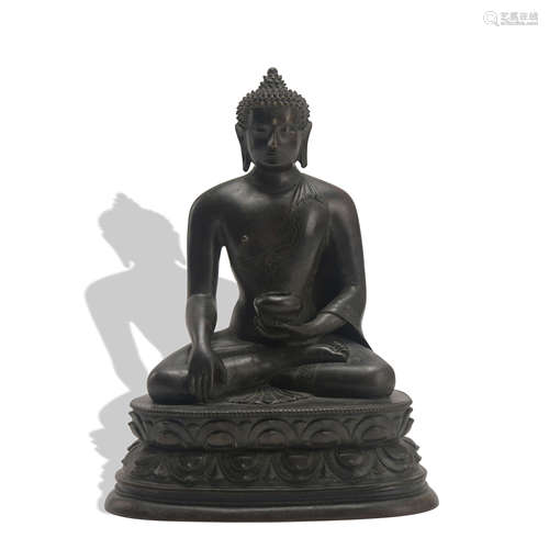 A bronze statue of Pharmacist Buddha