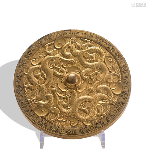 A gilt-bronze mirror