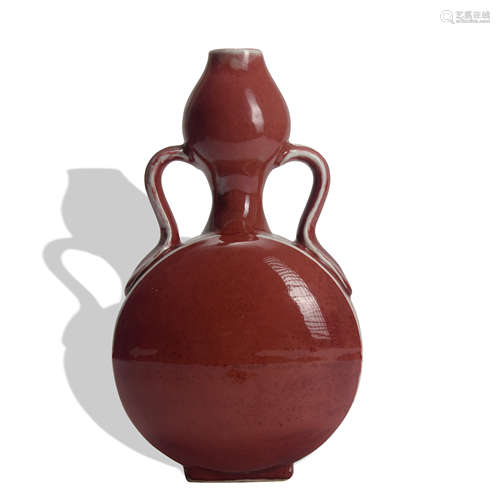 A red glazed moonflask