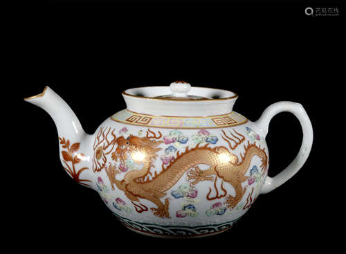 An allite red glazed 'dragon' teapot painting in gold