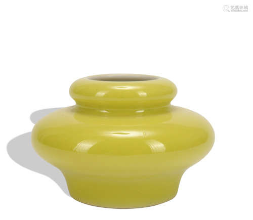 A yellow glazed vase